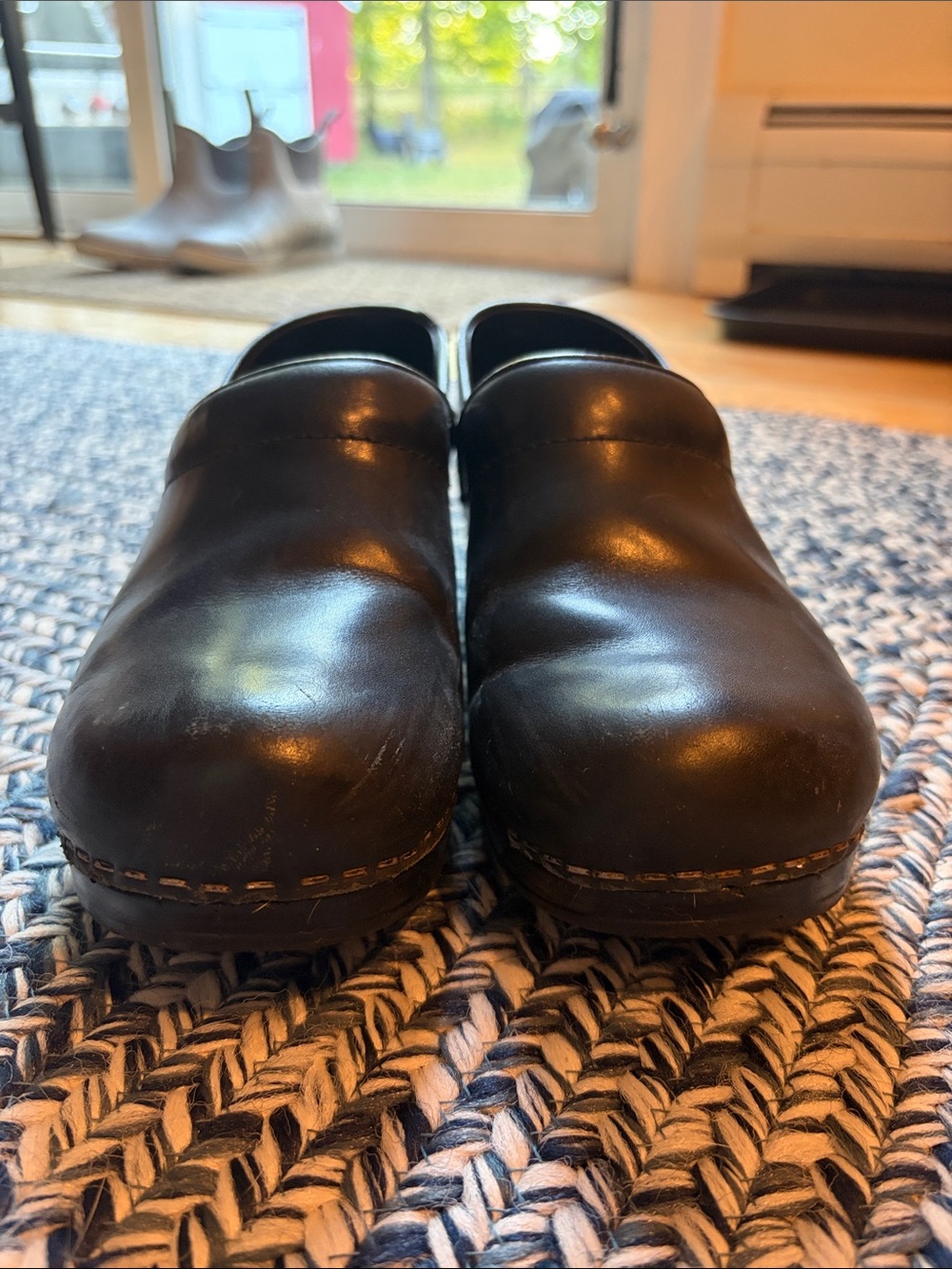 Women’s Black Dansko Leather Slip-On Clogs